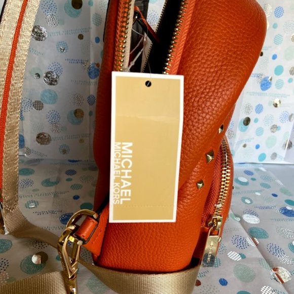 MICHAEL KORS SMALL LEATHER BACKPACK IN TANGERINE